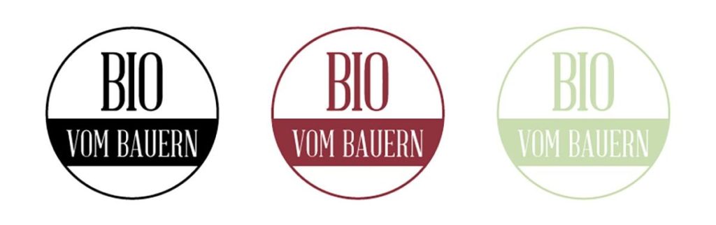 3 mal das Logo von Bio vom Bauern, einmal in schwarz, rot und hellgrün